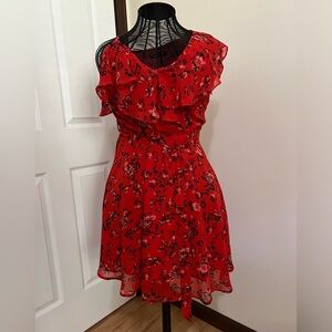 One-shoulder flowy summer dress.